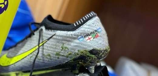 Lo scarpino di Palmer con la bandiera di Saint Kitts and Nevis